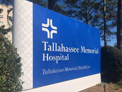 A sign is seen outside Tallahassee Memorial Hospital on February 3, 2023, in Tallahassee, Fla. (AP Photo/Anthony Izaguirre, File)