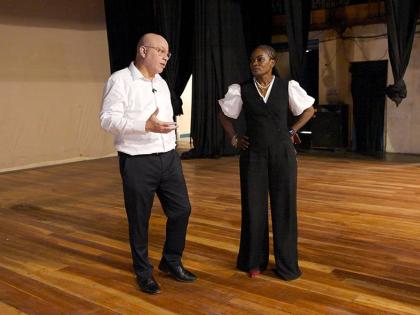 Jeffrey Hall (left), vice-chairman and CEO of Pan Jamaica Group, and Marisa Benain, executive director of the Little Theatre Movement Foundation, discuss the theatre’s need for a new cooling system and the importance of the preservation of historic cultu