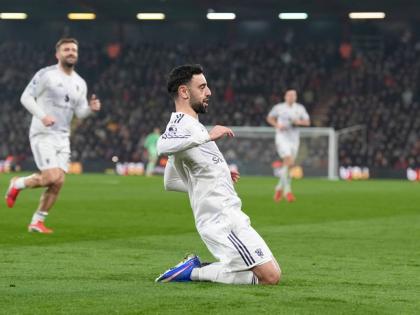Manchester United’s Bruno Fernandes celebrates after scoring during an English Premier League match against AFC Bournemouth yesterday in Bournemouth, England. The game ended in a 2-2 draw. 