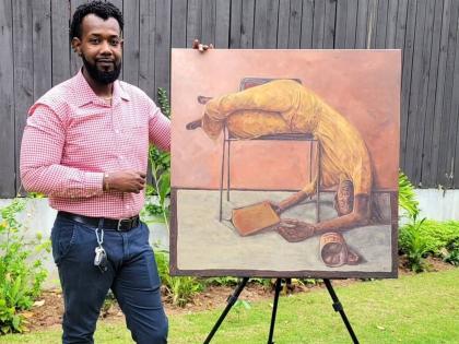 Romain Lewis with his piece ‘Wanderer’.