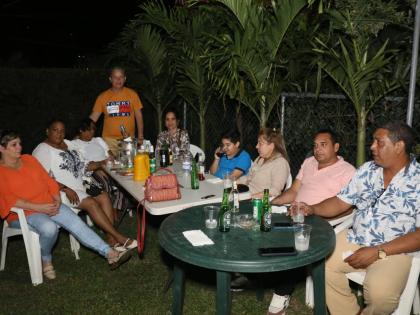 Some of the Cuban medical professionals and their families, hosted by Osmond Brown and his wife Karen, at farewell party in Kingston.