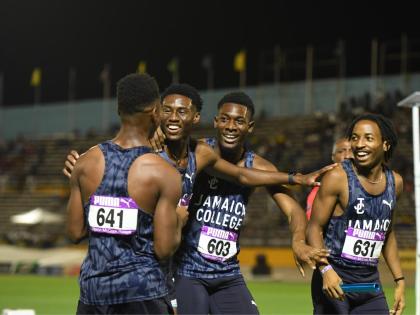 Jamaica College athletes celebrate after capturing the 4x400m Open final at the Gibson McCook Relays  on Saturday, February 28 at the National Stadium.