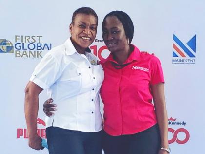 Colleen Montaque (left), Inter-Secondary Schools Sports Association executive, with Kimberly Smalling, account executive and Main Event Entertainment Group’s project manager for the ISSA/GraceKennedy Boys and Girls’ Athletics Championships.