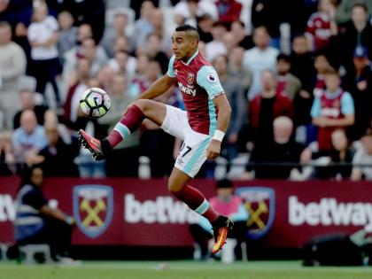 West Ham United’s Dimitri Payet controls the ball during the English Premier League football match against Southampton in London, on September 25, 2016.
