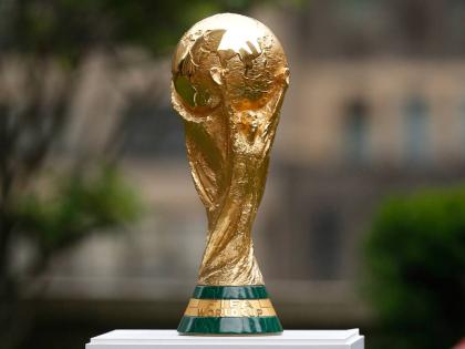 The FIFA World Cup Trophy is displayed before press conference at Rockefeller Plaza, June 16, 2022, in New York. (AP Photo/Noah K. Murray, File)