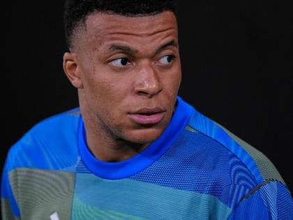 Real Madrid's Kylian Mbappe looks on before the Spanish La Liga soccer match between Real Madrid and Atletico Madrid in Madrid, Spain, Sunday, March 22, 2026. 
