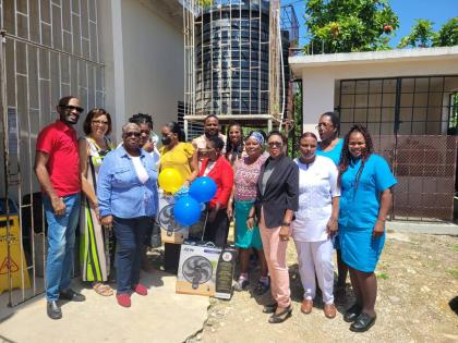 Members of the Little London Justice of the Peace Association during the presentation of two 18-inch wall fans to the Little London Clinic in Westmoreland.
