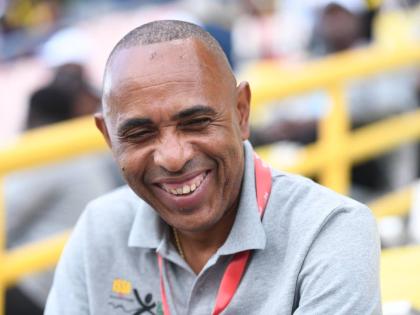 ISSA President Keith Wellington is all smiles on day one of the ISSA/GraceeKennedy Boys and Girls’ Athletics Championships inside the National Stadium yesterday.