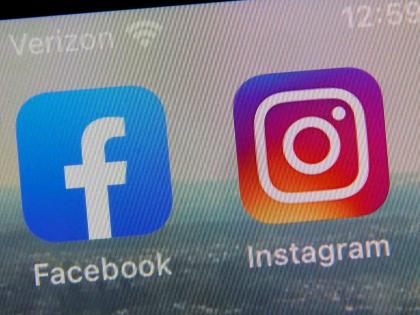 A view of the mobile phone app logos for, from left, Facebook and Instagram in New York, October 5, 2021. (AP Photo/Richard Drew, file)