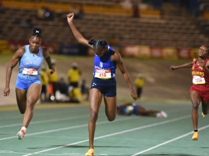 Shanoya Douglas powers to victory in the girls' Class One 100m final at the 2026 ISSA/GraceKennedy Boys and Girls’ Championships, clocking a personal best 10.98 seconds, on March 25. (Ian Allen photo)