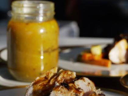 Spicy bourbon chicken served with a side of sauteed garlic butter vegetables and beef pumpkin soup. 