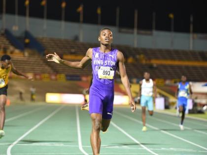 Jason Pitter of Kingston College smashes the Boys’ Class Two 400m record on day three of the ISSA GraceKennedy Boys and Girls’ Athletics Championships at the National Stadium last night.