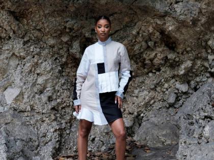 Above: Pistol black, pure white and ash grey combine to create this asymmetrical colour-block linen shirt dress. Howell’s design also features raised and inward pintucks, knife pleat tucks, pinstripe and subtle flare panel detailing, with a Mandarin coll