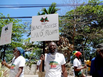 Dr Devon Taylor, president of Jamaica Beach Birthright Environmental Movement, leading a protest at Little Dunn’s River in this March 2024 photograph.