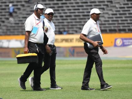Champs starters at work during the ISSA/GraceKennedy Boys and Girls' Athletics Championships inside the National Stadium, yesterday.