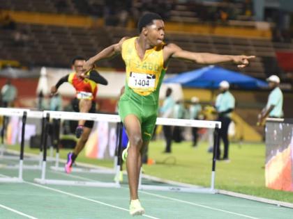 Marquies Page of St Jago High School blazes to a record-breaking 12.98 seconds to win his boys’ Class Two 110m hurdles semi-final at the ISSA GraceKennedy Boys and Girls Athletics Championships at the National Stadium on March 27, 2026. (Ian Allen photo)