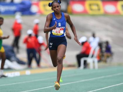Shanoya Douglas on her way to winning the girls’ Class 1 200m in a championship record at the 2026 ISSA/GraceKennedy Boys and Girls’ Athletics Championships inside the National Stadium yesterday. 