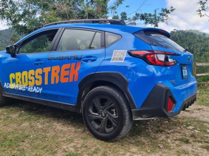 From the rear, the high-mounted spoiler and integrated diffuser elements highlight the aerodynamic refinements made to the third-generation body while maintaining a stout, planted stance.