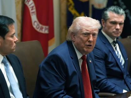 US President Donald Trump speaks during a Cabinet meeting at the White House, in Washington, DC. With him are Secretary of State Marco Rubio (left) and Secretary of Defence Pete Hegseth.