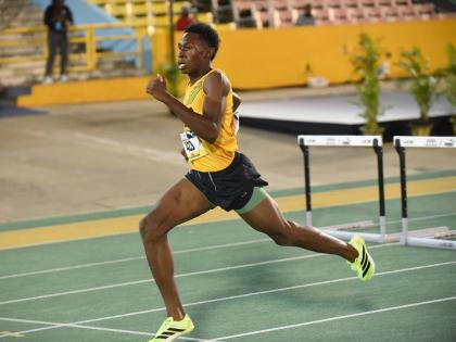 
Excelsior High School’s Jaeden Campbell in action in the Boys’ Class 2 400-metre hurdles at the ISSA/GracKennedy Boys and Girls’ Athletics Championships inside the National Stadium.