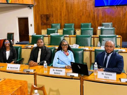Fi We Children Foundation representatives (from left): Jordaina Denton, Darrell Scott, Nickasha Dockery and Antonio Davis pose for a photo post their presentation in the Parliament.