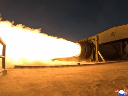 This undated photo provided by the North Korean government shows what it says is a solid-fuel engine test at an undisclosed place in North Korea. 