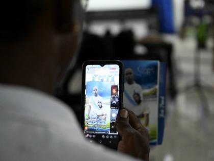A mourner at yesterday’s funeral for Kiero Pinnock at the Regent Street Seventh-day Adventist Church in Kingston. 