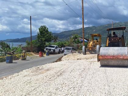 Work being done by the National Works Agency on a collapsed section of the Belmont main road in Westmoreland.