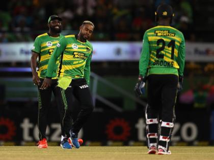 Fabian Allen (centre) of Jamaica Tallawahs celebrates after getting the wicket of Roston Chase of St Lucia Kings during the Republic Bank Caribbean Premier League T20 eliminator match at Providence Stadium in Georgetown, Guyana, on September 19, 2023.