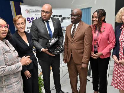 State Minister in the Ministry of Industry, Investment and Commerce, Delano Seiveright (third left), and Executive Director of the Bureau of Standards Jamaica (BSJ), Dr Velton Gooden (fourth left),  with (from left) Lead Youth and Education Programmes, Roa