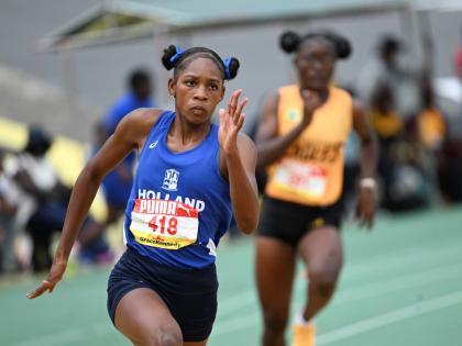 Shanoya Dougas of Holland High School on her way to winning the Girls’ Class One 200 metres at the ISSA/GraceKennedy Boys and Girls’ Athletics Championships.
