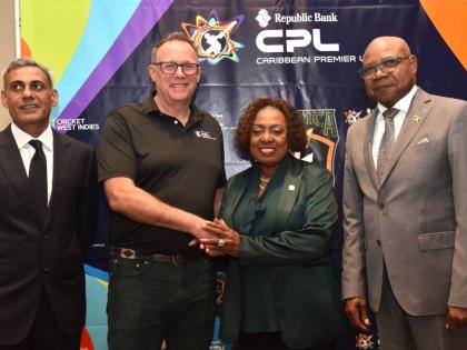 Minister of Culture, Gender, Entertainment and Sport Olivia Grange, Tourism Minister Edmund Bartlett (right), owner of Caribbean Premier League (CPL) T20 franchise, the Jamaica Kingsmen, Fawad Sarwar (left) and CPL Chief Exeecutive OFficer Pete Russell sta