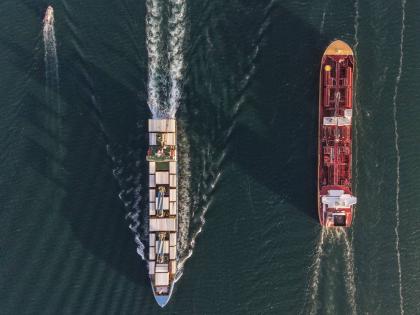 A bulk carrier and a cargo ship transit the Panama Canal in Panama City on March 12, 2026. (AP Photo/Matias Delacroix)
