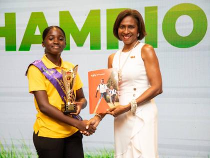 Kristen Lewis (left), the 2025 National Champion for the 12-14 age group, alongside Samantha Charles, CEO, VM Foundation, title sponsor of the National Reading Competition. Lewis is encouraging this year’s young entrants to be determined, ambitious and c