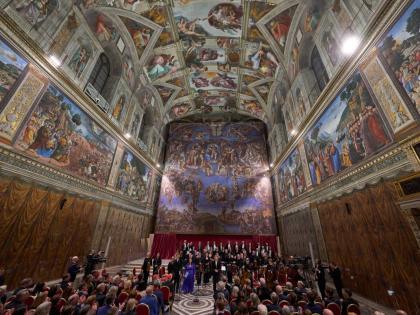 
Conductor Harry Christophers (centre) with tenor Matthew McKinney (left), soprano Elizabeth Watts (second from left), and The Sixteen present Angels Unawares by James MacMillan in the Sistine Chapel at the Vatican, on Sunday, March 22.