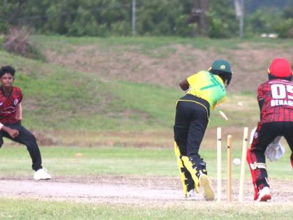 Trinidad and Tobago  leg spinner Arnaldo Premchand (second left) bowls Jamaica’s Najai Wright to win the third match of their CWI Rising Stars series at the Jamaica Broilers Ground on Thursday.