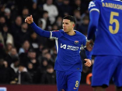 Chelsea’s Enzo Fernandez celebrates after scoring his side’s third goal during an English FA Cup fourth round  match between Aston Villa and Chelsea at the Villa Park Stadium in Birmingham, England in 2024.