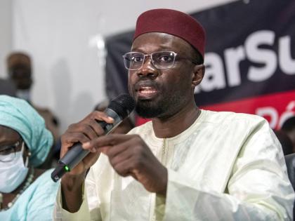 Senegalese opposition leader Ousmane Sonko addresses journalists following his release from police custody in Dakar, Senegal, on March 8, 2021. (AP Photo/Sylvain Cherkaoui, File)