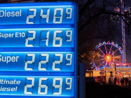 Gas prices are displayed near a ferris wheel in Frankfurt, Germany, Thursday, April 2, 2026. (AP Photo/Michael Probst)