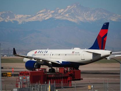 A Delta Airlines jetliner taxis to a runway for take off from Denver International Airport, March 20, 2026, in Denver. (AP Photo/David Zalubowski, File)