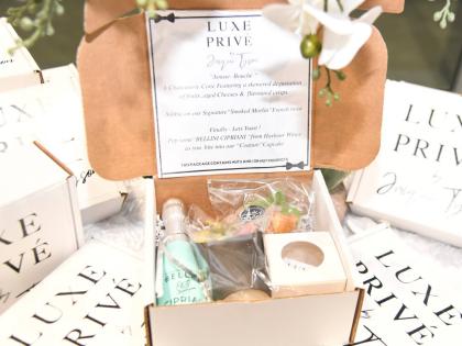 Chef Jacqui Tyson’s Luxe Privé Gourmet Box offers an elevated take on the classic picnic experience, featuring Bellini Cipriani prosecco, charcuterie in a cup, smoked marlin with a French-inspired twist, and a croissant and cupcake pairing designed as a