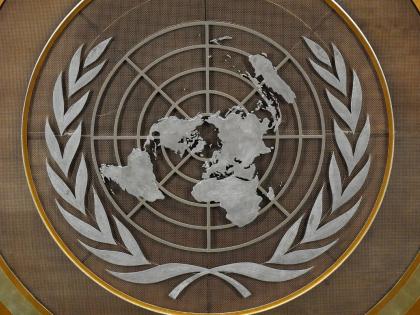 FILE - The United Nations logo is seen inside the 79th session of the United Nations General Assembly, Tuesday, Sept. 24, 2024. 