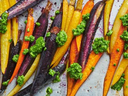 Roasted carrots topped with spinach-parsley pesto.