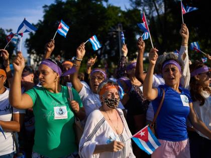 Women attend a rally calling for the end of the US blockade against the island nation in Havana, Cuba, on Tuesday.