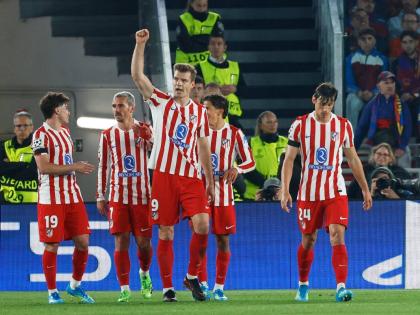 Atlético Madrid’s Alexander Sorloth (centre) celebrates after scoring his side’s second goal during the Champions League quarter-final first-leg match against Barcelona in Barcelona, Spain, yesterday.