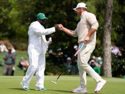 Actor Kevin Hart (left) celebrates with Bryson DeChambeau on the third hole during Augusta National’s Par-3 Contest ahead of the Masters golf tournament at the Augusta National Golf Club in Augusta, Georgia, yesterday.