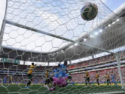 DR Congo’s Axel Tuanzebe (centre) scores the game’s only goal during the World Cup Intercontinental Play-off final match against Jamaica in Guadalajara, Mexico, on Tuesday, March 31.