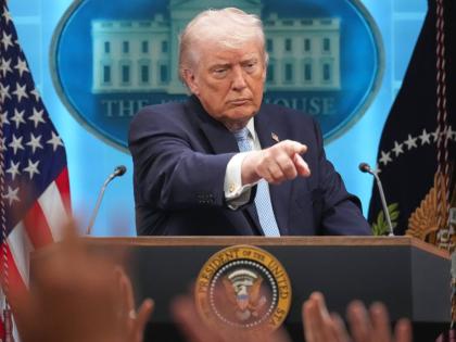 President Donald Trump speaks with reporters during a news conference in the James Brady Press Briefing Room at the White House.