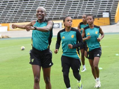 Members of the Reggae Girlz squad go through their paces during their a training session at the National Stadium yesterday ahead of today’s Concacaf World Cup qualifying match against Antgua and Barbuda. The match kicks off at 7 p.m.