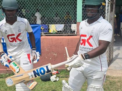 St. Jago openers Danza Hyatt Jr and Luwayne Pryce at Melbourne Oval during the second day of the Spaulding Cup final at Melbourne Oval yesterday.
